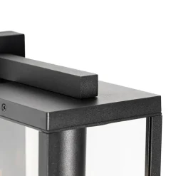 QAZQA Buiten wandlantaarn zwart IP44 met schemersensor - Charlois
